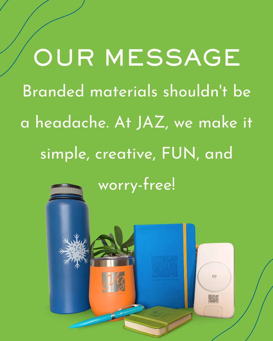 Branded promotional products from JAZ Print & Promo's own photography — engraved water bottle, tumbler, notebooks, pen and power bank